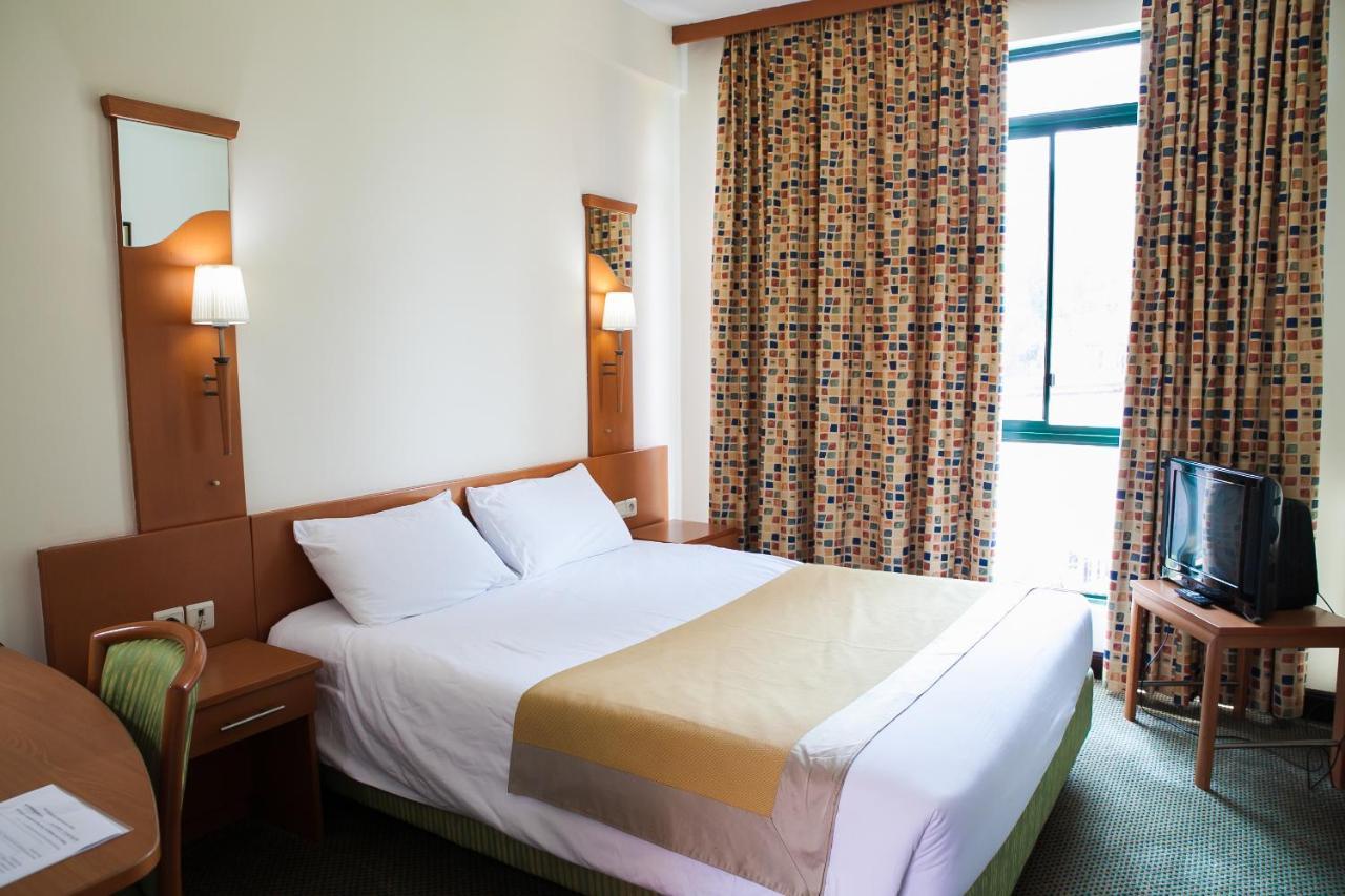 Gorillas City Centre Hotel Кигали Экстерьер фото