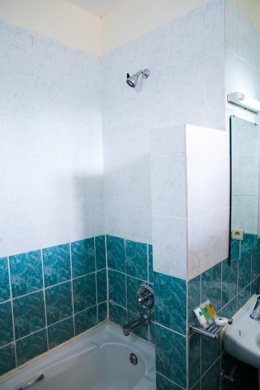 Gorillas City Centre Hotel Кигали Номер фото