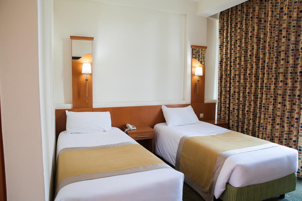 Gorillas City Centre Hotel Кигали Номер фото